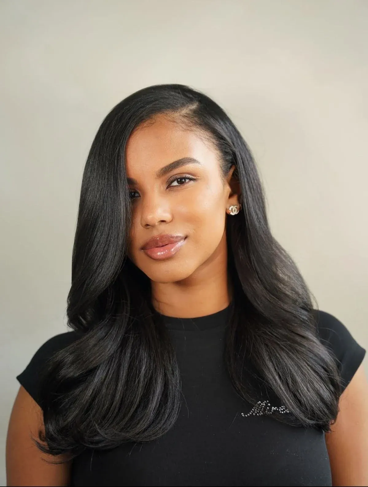 Absa client with long, sleek styled hair